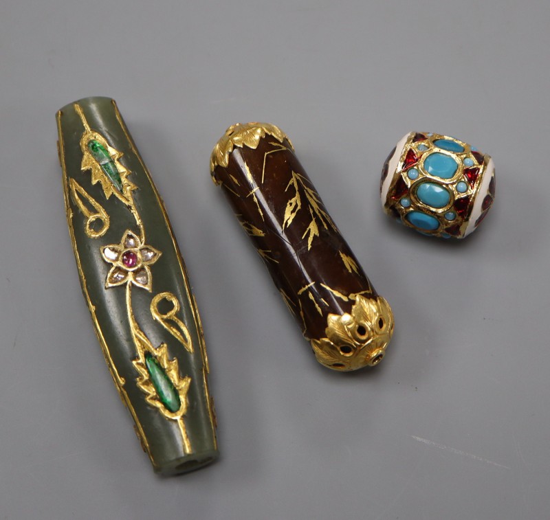 Three assorted Indian curios including gem and diamond set and enamelled, largest 7cm.